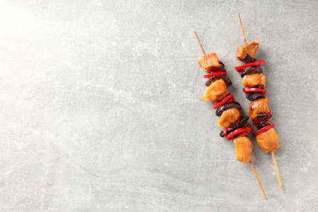 Tasty chicken shashlik on gray textured backgroundの写真素材