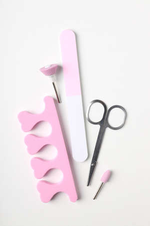 Concept of nail care with manicure accessories on white backgroundの写真素材