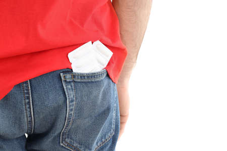 Man with suppositories in pocket, isolated on white background. Hemorrhoids conceptの写真素材