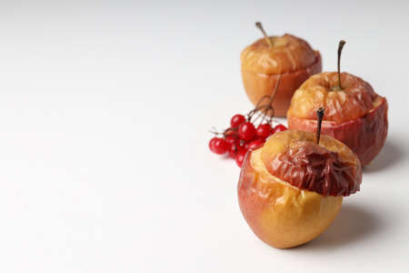 Concept of tasty food with baked apples on white backgroundの写真素材