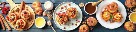 Concept of tasty food with baked apple on wooden backgroundの写真素材