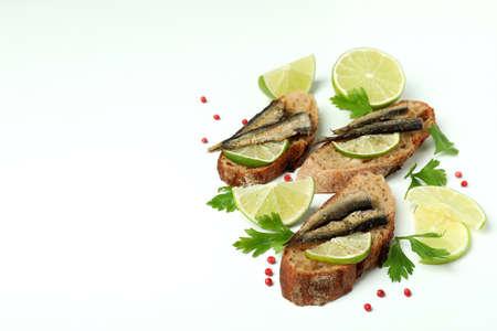 Delicious sandwiches with sprats on white backgroundの写真素材