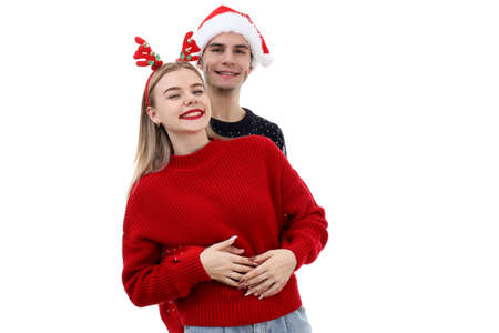 Cute and attractive couple on pink backgroundの写真素材