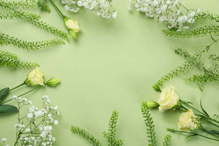 "Hello spring" concept on green background, space for textの写真素材