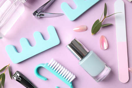 Concept of nail care with manicure accessories on pink backgroundの写真素材