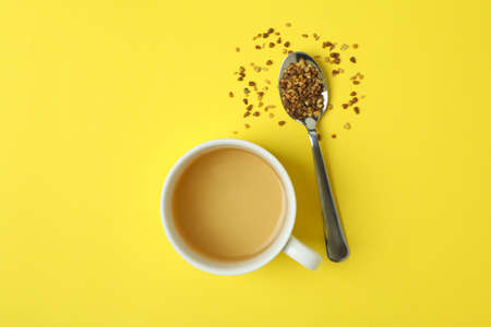 Concept of hot drink with buckwheat tea on yellow backgroundの写真素材