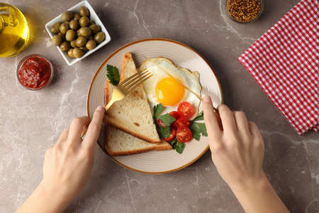 Concept of tasty breakfast on gray textured background