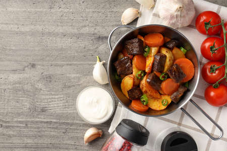 Concept of tasty food with beef with vegetables, space for textの写真素材