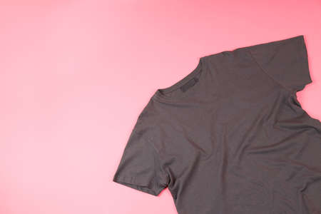Dark t-shirt with space for print on pink backgroundの写真素材