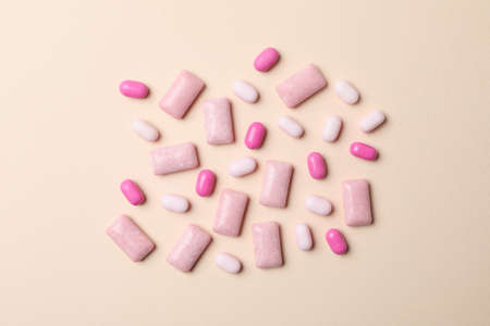 Chewing or bubble gum on beige backgroundの写真素材