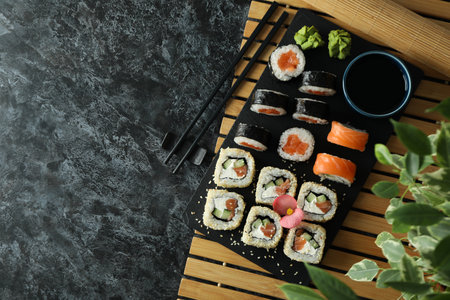 Concept of tasty food with sushi rolls, space for textの写真素材