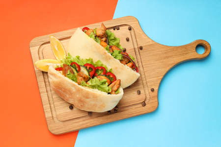 Concept of tasty food with pita with chicken, top viewの写真素材