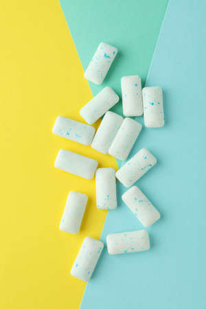 Chewing or bubble gum on multicolored backgroundの写真素材