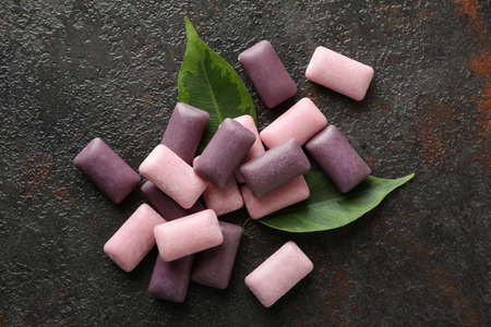 Chewing or bubble gum on dark textured backgroundの写真素材