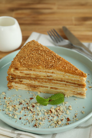 Concept of tasty dessert with honey cake, close up
