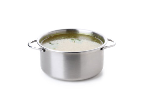 Pan with chicken soup or broth isolated on white backgroundの写真素材