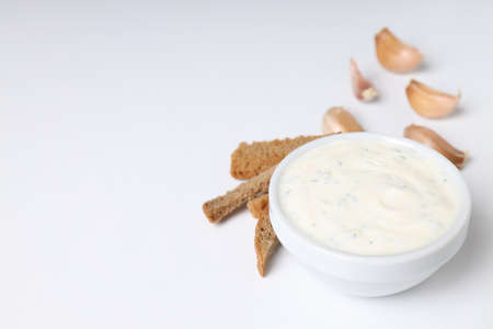 Concept of tasty food with garlic sauce, space for textの写真素材