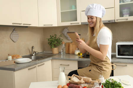 Concept of home cooking with female chef