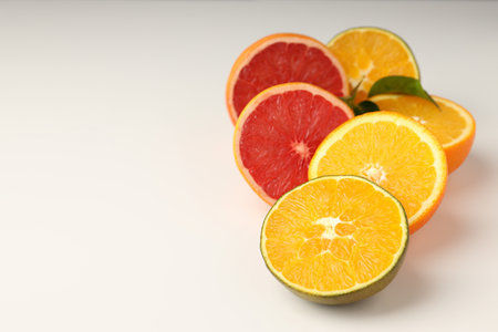 Citrus fruits on white background, space for textの写真素材