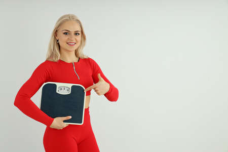 Concept of healthy lifestyle with sporty woman, space for text