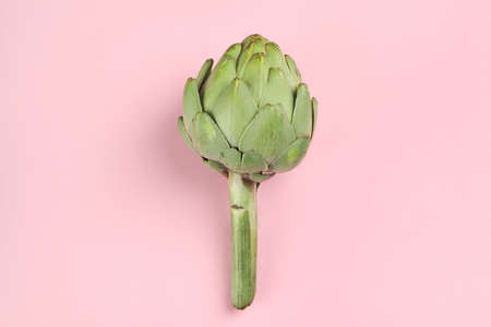Concept of healthy food with artichoke on pink backgroundの写真素材