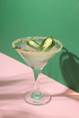Concept of drink with Jalapeno cocktail on two tone backgroundの写真素材
