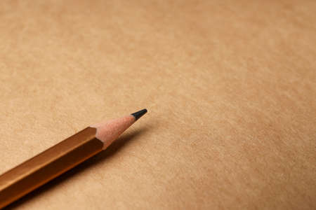 Craft notebook with pencil, close up and selective focusの写真素材