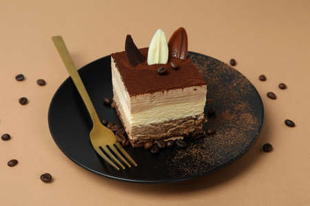 Concept of tasty dessert with Tiramisu cake, close up
