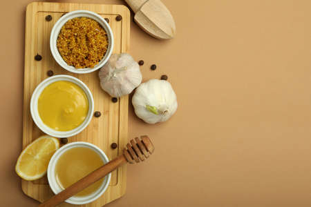 Concept of cooking honey mustard sauce, space for textの写真素材
