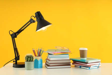 Concept of preparing to exams or tests on yellow backgroundの写真素材