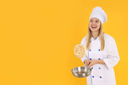 Concept of cooking with young woman, space for textの写真素材