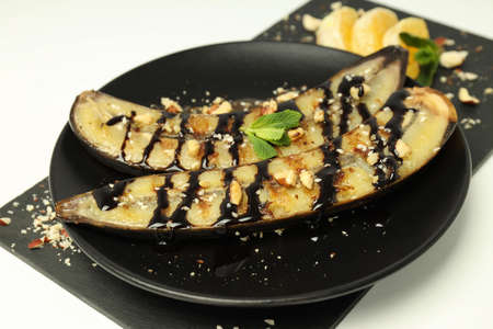 Concept of tasty food with grilled banana, close upの写真素材