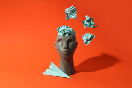 Concept of problems with memory, amnesia disease on orange background