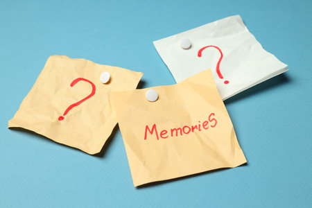 Concept of problems with memory, amnesia disease on blue background