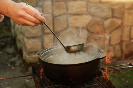 Concept of cooking soup on the fireの写真素材