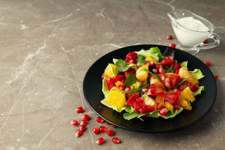 Concept of tasty food, salad with red orange, space for textの写真素材