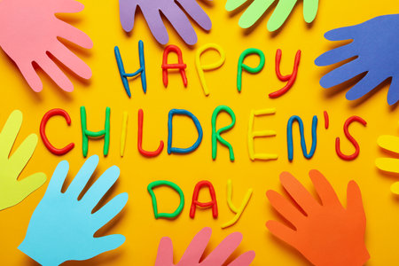 Concept of World Children's Day on orange backgroundの写真素材