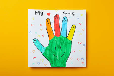 Concept of World Children's Day on orange background