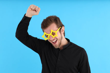 Concept of people with young man on blue background