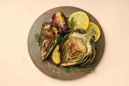Concept of tasty food with grilled artichoke, top viewの写真素材