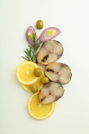 Concept of tasty food with smoked mackerel on white background
