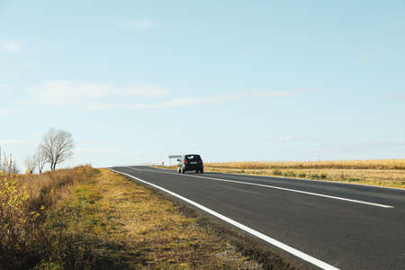 Concept of travel and adventure, asphalt road