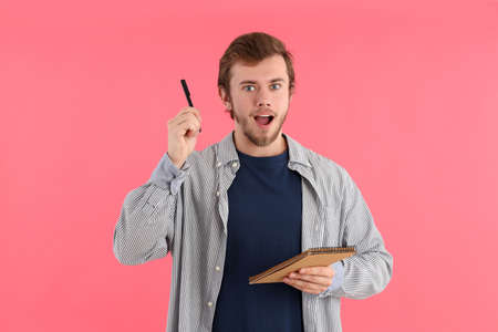 Concept of people with young man on pink background