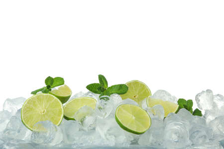 Ice mint and lime isolated on white backgroundの写真素材