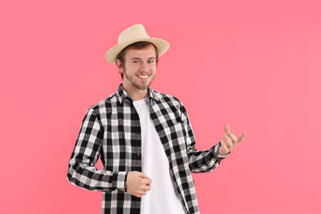 Concept of people, young man on pink backgroundの写真素材