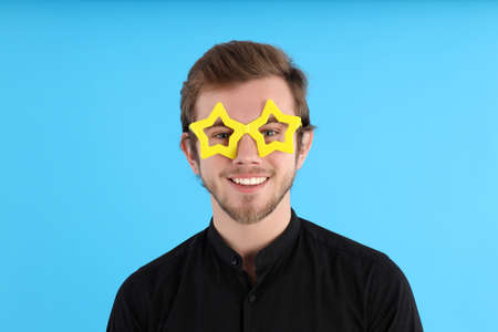 Concept of people, young man on blue background