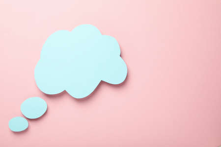 Speech bubble on pink background, space for textの写真素材