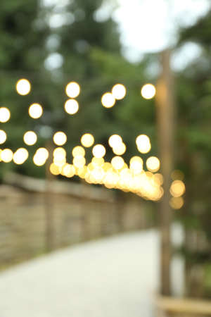 Beautiful park in mountain resort with blurred lights