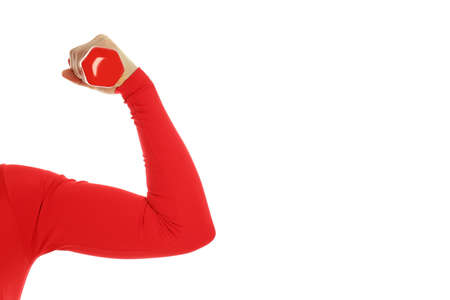 Sporty woman showing biceps, isolated on white backgroundの写真素材