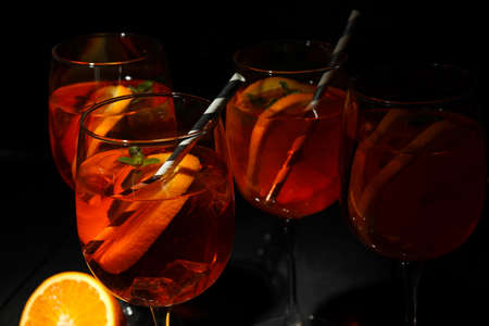 Concept of summer alcohol drink, Aperol Spritz against dark backgroundの写真素材